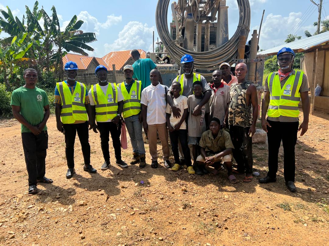 Prudent Link crew with community at drilling site